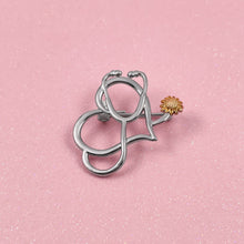 Load image into Gallery viewer, Sunflower Stethoscope Heart Pin