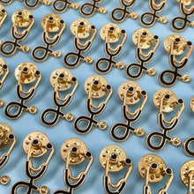 Load image into Gallery viewer, 25pc Black/Gold Stethoscope Pin Pack
