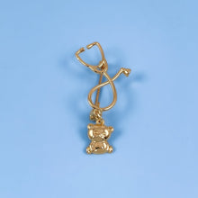Load image into Gallery viewer, Gold Dainty Teddy Bear Stethoscope Pin
